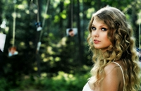 W de Swift: Los looks de Taylor en los CMAs